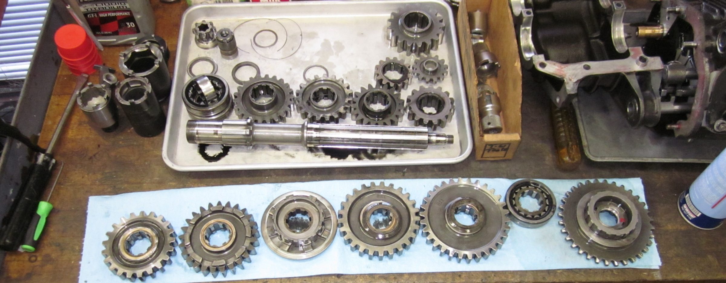 Maserati T61 Birdcage Gears laid out on the bench